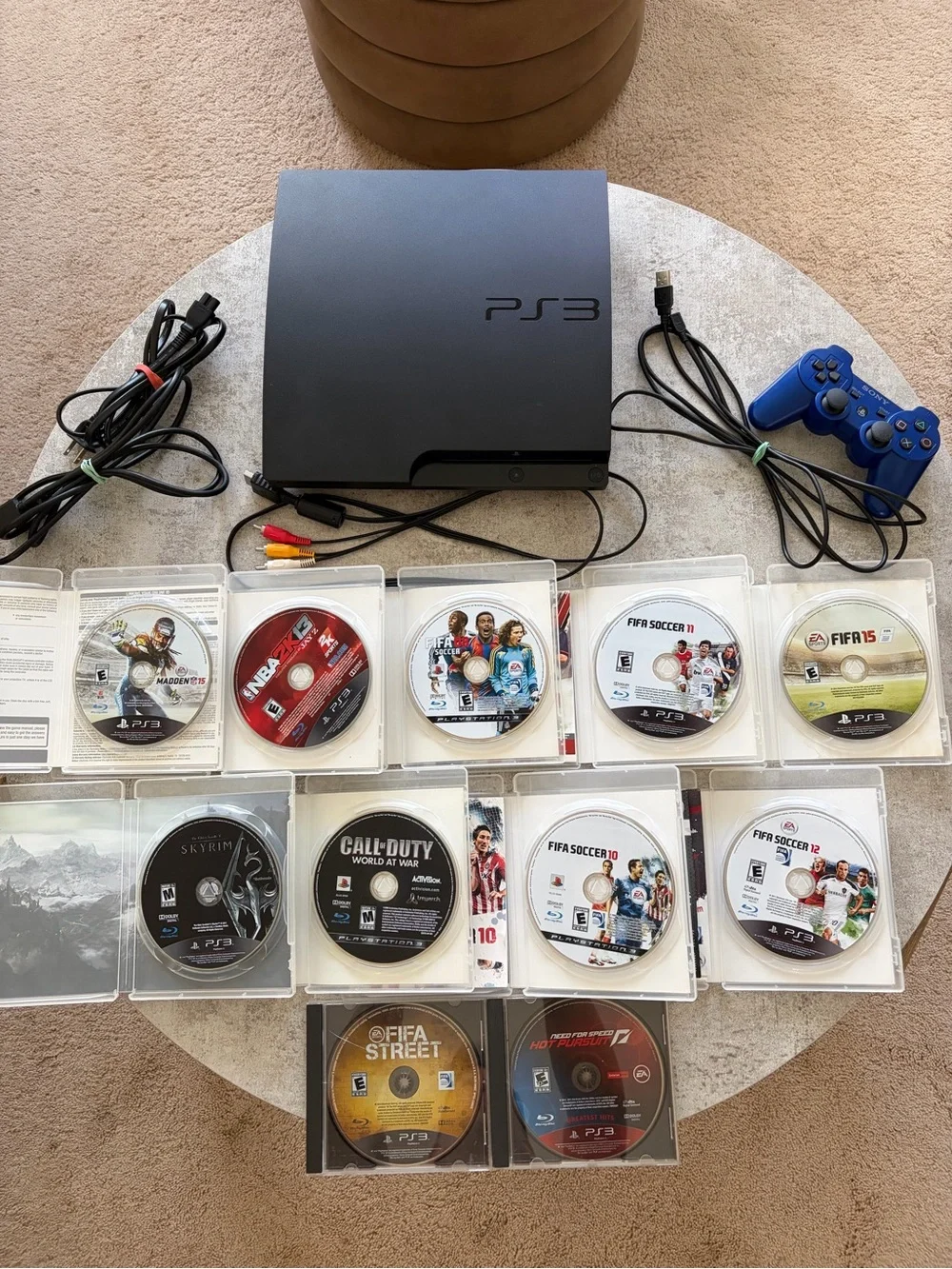 Sony PS3 Slim Black Console with Blue DualShock 3 Controller & 11 Game Bundle